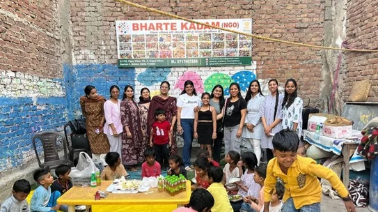 Bharte Kadam Foundation volunteers and children during a community activity